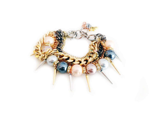 "Exquisite Handmade Pearl Cuff Bracelet with Gold Chains, Sparkling Rhinestones, and Fashionable Charms - a Must-Have Trendy Jewelry Piece!"